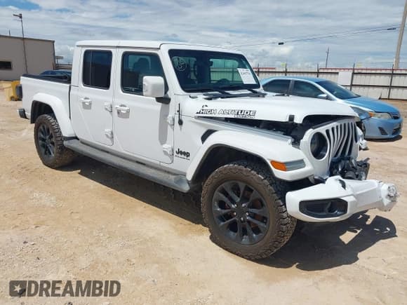 ✅ 2023 Jeep Gladiator Overland • VIN: 1C6HJTFG7PL579008 • Lot: 42443754. Listed on IAAI with 30,698 mi. Free auction sales archive from the USA and detailed vehicle history report at DreamBid. Image 1.