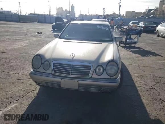✅ 1999 Mercedes-Benz E 320 • VIN: WDBJF65H9XA874886 • Lot: 82583865. Listed on Copart with 158,804 mi. Free auction sales archive from the USA and detailed vehicle history report at DreamBid. Image 13.