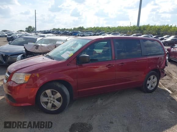 ✅ 2014 Dodge Grand Caravan SE 30th Anniversary • VIN: 2C4RDGBG1ER341791 • Lot: 43285408. Listed on IAAI with 100,854 mi. Free auction sales archive from the USA and detailed vehicle history report at DreamBid. Image 13.