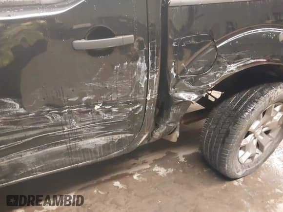 2020 Nissan Frontier SV with VIN 1N6ED0EBXLN710208, listed as a IAAI auction lot 41137154 with 28,760 mi miles and . Bid and sale history available at DreamBid. Image 6.