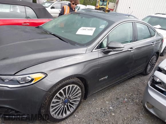 ✅ 2017 Ford Fusion Hybrid Titanium • VIN: 3FA6P0RU5HR301716 • Lot: 42017600. Listed on IAAI with 147,232 mi. Free auction sales archive from the USA and detailed vehicle history report at DreamBid. Image 14.