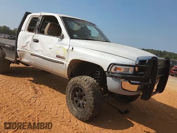 ✅ 1999 Dodge 2500 • VIN: 1B7KF2369XJ639551 • Лот: 80616115. Опубликован ранее на Copart с пробегом 216 208 миль. Бесплатный доступ к архиву аукционных продаж из США и подробный отчёт об истории автомобиля на DreamBid. Изображение 13.