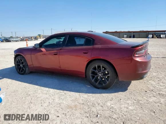 2021 Dodge Charger SXT с VIN 2C3CDXBG0MH512559, выставлен на аукционе Copart как лот 84485215 с пробегом 125 090 миль миль и Списание • Salvage title. История ставок и продаж доступна на DreamBid. Изображение 2.