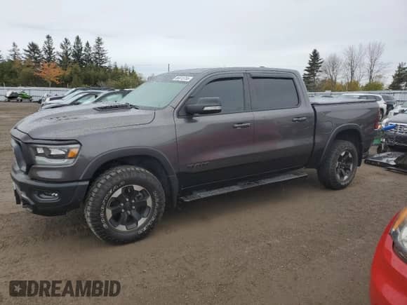 2022 Ram 1500 Rebel with VIN 1C6SRFLT1NN293092, listed as a Copart auction lot 86813755 with 60,940 mi miles and Clean title. Bid and sale history available at DreamBid. Image 1.