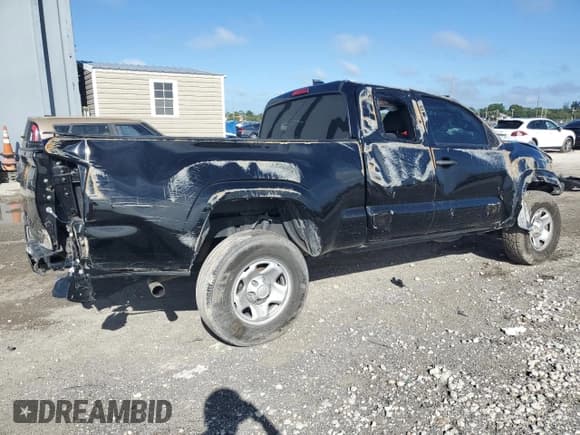 ✅ 2023 Toyota Tacoma SR • VIN: 3TYRX5GN9PT067936 • Lot: 81896565. Listed on Copart with 84,619 mi. Free auction sales archive from the USA and detailed vehicle history report at DreamBid. Image 3.