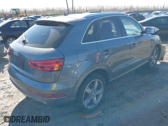 ✅ 2015 Audi Q3 Premium Plus • VIN: WA1BFCFS4FR005217 • Лот: 41586388. Опубликован ранее на IAAI с пробегом 124 511 миль. Бесплатный доступ к архиву аукционных продаж из США и подробный отчёт об истории автомобиля на DreamBid. Изображение 4.