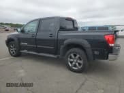 ✅ 2015 Nissan Titan SV • VIN: 1N6AA0EC2FN503980 • Lot: 64664665. Listed on Copart with 124,589 mi. Free auction sales archive from the USA and detailed vehicle history report at DreamBid. Image 2.