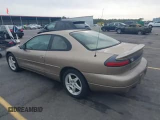✅ 1998 Dodge Avenger ES • VIN: 4B3AU52N3WE067556 • Lot: 43770420. Listed on IAAI with 218,750 mi. Free auction sales archive from the USA and detailed vehicle history report at DreamBid. Image 3.