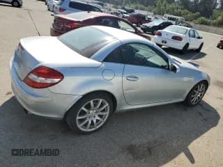 ✅ 2005 Mercedes-Benz SLK 230/320 • VIN: WDBWK56F75F059871 • Лот: 74153334. Опубликован ранее на Copart с пробегом 128 999 миль. Бесплатный доступ к архиву аукционных продаж из США и подробный отчёт об истории автомобиля на DreamBid. Изображение 3.