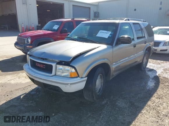 ✅ 2001 GMC Jimmy SLE • VIN: 1GKCS13W312204086 • Лот: 41693507. Опубликован ранее на IAAI с пробегом 177 439 миль. Бесплатный доступ к архиву аукционных продаж из США и подробный отчёт об истории автомобиля на DreamBid. Изображение 2.