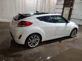 ✅ 2012 Hyundai Veloster w/Red Int • VIN: KMHTC6AD7CU030162 • Lot: 73692164. Listed on Copart with 101,371 mi. Free auction sales archive from the USA and detailed vehicle history report at DreamBid. Image 3.