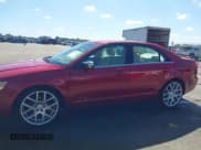 ✅ 2009 Lincoln MKZ • VIN: 3LNHM26T09R629187 • Lot: 43375377. Listed on IAAI with 133,765 mi. Free auction sales archive from the USA and detailed vehicle history report at DreamBid. Image 14.