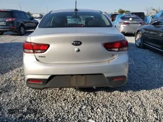 ✅ 2018 Kia Rio S • VIN: 3KPA24AB7JE100157 • Лот: 93726885. Опубликован ранее на Copart с пробегом 69 484 миль. Бесплатный доступ к архиву аукционных продаж из США и подробный отчёт об истории автомобиля на DreamBid. Изображение 6.