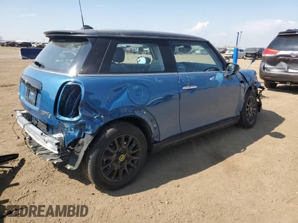 ✅ 2023 MINI Hardtop Cooper SE • VIN: WMW13DJ03P2T91531 • Лот: 54220585. Опубликован ранее на Copart с пробегом 7 054 миль. Бесплатный доступ к архиву аукционных продаж из США и подробный отчёт об истории автомобиля на DreamBid. Изображение 3.