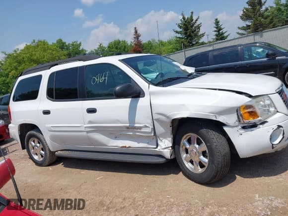 ✅ 2004 GMC Envoy SLT • VIN: 1GKET16S646135986 • Lot: 42420464. Listed on IAAI with 132,741 mi. Free auction sales archive from the USA and detailed vehicle history report at DreamBid. Image 13.
