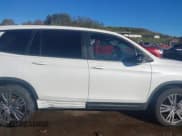 ✅ 2021 Honda Passport EX-L • VIN: 5FNYF7H50MB005622 • Lot: 43414944. Wystawiony na IAAI z przebiegiem 63 802 mil. Bezpłatny archiwum sprzedaży aukcyjnych z USA i szczegółowy raport historii pojazdu na DreamBid. Zdjęcie 14.