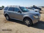 ✅ 2010 Mercury Mariner • VIN: 4M2CN9BG9AKJ17511 • Lot: 63789835. Listed on Copart with 152,609 mi. Free auction sales archive from the USA and detailed vehicle history report at DreamBid. Image 4.