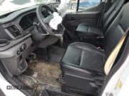 ✅ 2023 Ford Transit Cargo • VIN: 1FTBW3X81PKB10025 • Lot: 60060385. Listed on Copart with 13,811 mi. Free auction sales archive from the USA and detailed vehicle history report at DreamBid. Image 7.