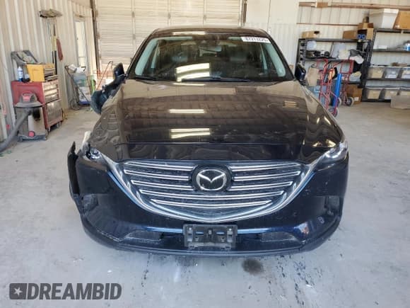 ✅ 2022 Mazda CX-9 Touring • VIN: JM3TCBCY0N0607760 • Lot: 87213225. Wystawiony na Copart z przebiegiem 69 312 mil. Bezpłatny archiwum sprzedaży aukcyjnych z USA i szczegółowy raport historii pojazdu na DreamBid. Zdjęcie 5.