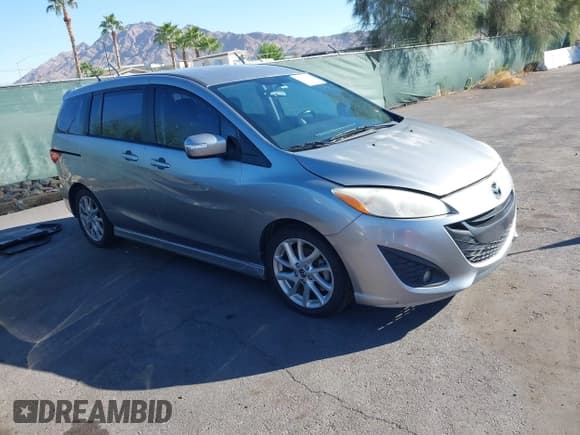 ✅ 2013 Mazda 5 Touring • VIN: JM1CW2CL2D0160965 • Lot: 43410114. Listed on IAAI with 107,043 mi. Free auction sales archive from the USA and detailed vehicle history report at DreamBid. Image 1.