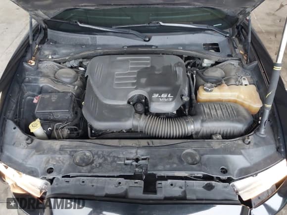 ✅ 2013 Dodge Charger SE • VIN: 2C3CDXBG3DH720189 • Lot: 43682173. Listed on IAAI with 210,704 mi. Free auction sales archive from the USA and detailed vehicle history report at DreamBid. Image 10.