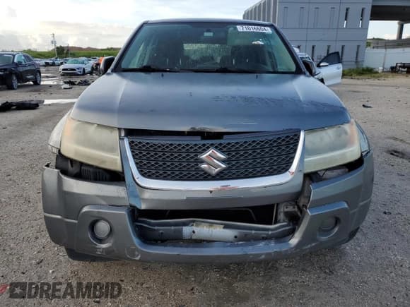 ✅ 2010 Suzuki Grand Vitara Premium • VIN: JS3TE0D21A4101120 • Лот: 71016604. Опубликован ранее на Copart с пробегом 99 917 миль. Бесплатный доступ к архиву аукционных продаж из США и подробный отчёт об истории автомобиля на DreamBid. Изображение 5.