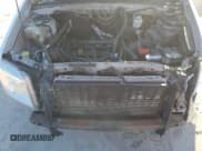 ✅ 2009 Mercury Mariner • VIN: 4M2CU91739KJ17228 • Lot: 88493725. Listed on Copart with 167,683 mi. Free auction sales archive from the USA and detailed vehicle history report at DreamBid. Image 12.