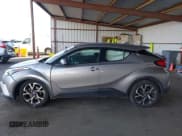 ✅ 2018 Toyota C-HR XLE • VIN: NMTKHMBX4JR041814 • Лот: 43610173. Опубликован ранее на IAAI с пробегом 77 502 миль. Бесплатный доступ к архиву аукционных продаж из США и подробный отчёт об истории автомобиля на DreamBid. Изображение 14.