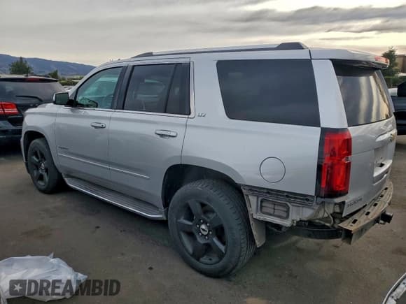 ✅ 2015 Chevrolet Tahoe LTZ • VIN: 1GNSCCKC6FR241839 • Lot: 95256935. Listed on Copart with 73,909 mi. Free auction sales archive from the USA and detailed vehicle history report at DreamBid. Image 2.