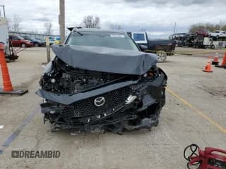 ✅ 2021 Mazda CX-30 Select • VIN: 3MVDMBBLXMM313812 • Lot: 49579454. Wystawiony na Copart z przebiegiem 29 283 mil. Bezpłatny archiwum sprzedaży aukcyjnych z USA i szczegółowy raport historii pojazdu na DreamBid. Zdjęcie 5.