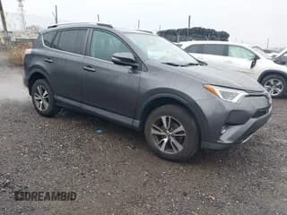 ✅ 2016 Toyota RAV4 XLE • VIN: 2T3RFREV6GW523821 • Lot: 43738888. Listed on IAAI with 103,014 mi. Free auction sales archive from the USA and detailed vehicle history report at DreamBid. Image 1.