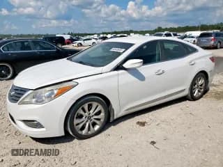 ✅ 2013 Hyundai Azera • VIN: KMHFG4JG0DA288770 • Лот: 80545695. Опубликован ранее на Copart с пробегом 162 977 миль. Бесплатный доступ к архиву аукционных продаж из США и подробный отчёт об истории автомобиля на DreamBid. Изображение 1.