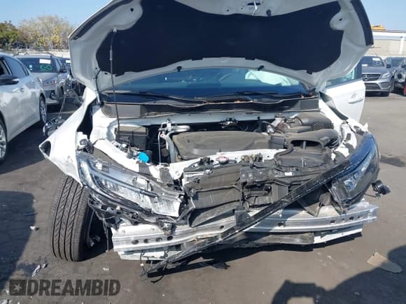 ✅ 2025 Honda Odyssey Touring • VIN: 5FNRL6H83SB005645 • Lot: 43507137. Listed on IAAI with 6,051 mi. Free auction sales archive from the USA and detailed vehicle history report at DreamBid. Image 22.