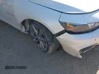 2017 Chevrolet Malibu Premier z VIN 1G1ZH5SX3HF109724, wystawiony jako IAAI lot #43117243 z przebiegiem 86 952 mil mil oraz . Historia ofert i sprzedaży dostępna na DreamBid. Obrazek 6.