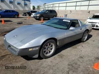 1985 Chevrolet Corvette with VIN 1G1YY0782F5116893, listed as a Copart auction lot 63288005 with 168,067 mi miles and Salvage title. Bid and sale history available at DreamBid. Image 1.
