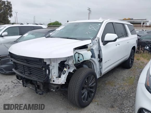 ✅ 2022 Chevrolet Suburban LT • VIN: 1GNSKCKD2NR174442 • Lot: 41902034. Listed on IAAI with 41,120 mi. Free auction sales archive from the USA and detailed vehicle history report at DreamBid. Image 20.