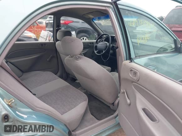 ✅ 1999 Ford Escort LX • VIN: 1FAFP10P5XW210499 • Lot: 42935783. Listed on IAAI with 73,567 mi. Free auction sales archive from the USA and detailed vehicle history report at DreamBid. Image 8.