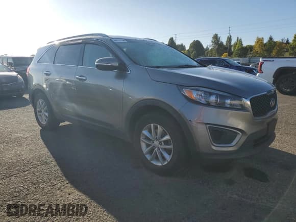 ✅ 2016 Kia Sorento LX • VIN: 5XYPGDA32GG062255 • Lot: 84055635. Wystawiony na Copart z przebiegiem 210 238 mil. Bezpłatny archiwum sprzedaży aukcyjnych z USA i szczegółowy raport historii pojazdu na DreamBid. Zdjęcie 4.