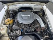 ✅ 1978 Mercedes-Benz SL • VIN: 10704412045023 • Lot: 55180895. Wystawiony na Copart z przebiegiem 126 465 mil. Bezpłatny archiwum sprzedaży aukcyjnych z USA i szczegółowy raport historii pojazdu na DreamBid. Zdjęcie 7.