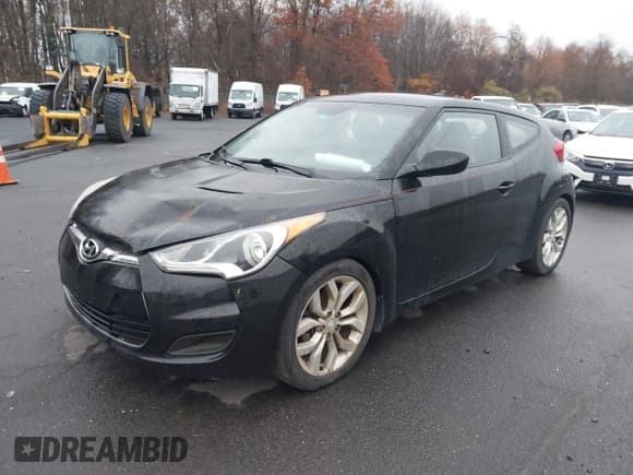✅ 2013 Hyundai Veloster w/Black Int • VIN: KMHTC6AD3DU124007 • Lot: 43653071. Wystawiony na IAAI z przebiegiem 128 114 mil. Bezpłatny archiwum sprzedaży aukcyjnych z USA i szczegółowy raport historii pojazdu na DreamBid. Zdjęcie 2.