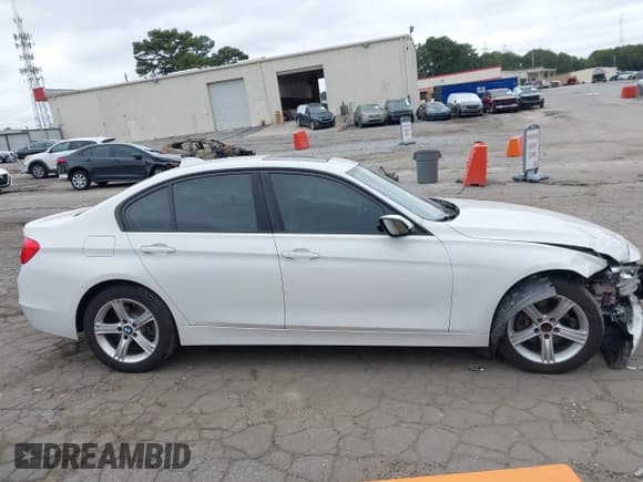 ✅ 2015 BMW 3 Series 328i • VIN: WBA3A5C51FP605558 • Lot: 43335331. Listed on IAAI with 112,895 mi. Free auction sales archive from the USA and detailed vehicle history report at DreamBid. Image 13.