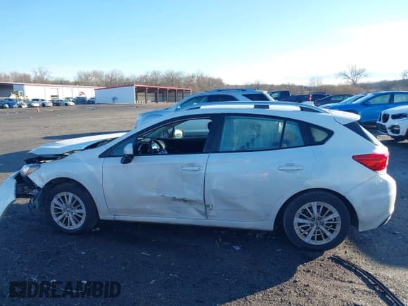 ✅ 2018 Subaru Impreza Premium • VIN: 4S3GTAB66J3741640 • Lot: 41193045. Listed on IAAI with 110,245 mi. Free auction sales archive from the USA and detailed vehicle history report at DreamBid. Image 14.