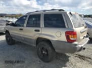 ✅ 1999 Jeep Grand Cherokee Laredo • VIN: 1J4GW58N0XC692998 • Lot: 86833535. Wystawiony na Copart z przebiegiem 130 532 mil. Bezpłatny archiwum sprzedaży aukcyjnych z USA i szczegółowy raport historii pojazdu na DreamBid. Zdjęcie 2.