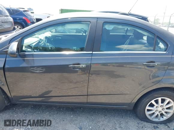 2017 Chevrolet Sonic LT with VIN 1G1JD5SB6H4154391, listed as a IAAI auction lot 42581620 with 83,073 mi miles and . Bid and sale history available at DreamBid. Image 15.