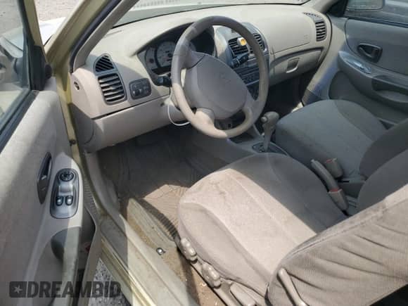 2001 Hyundai Accent GS z VIN KMHCG35C91U126523, wystawiony jako Copart lot #59768915 z przebiegiem 211 198 mil mil oraz Szkoda całkowita • Salvage title. Historia ofert i sprzedaży dostępna na DreamBid. Obrazek 8.