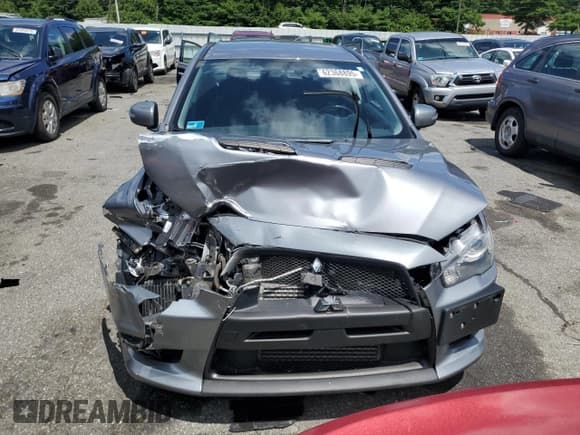 ✅ 2015 Mitsubishi Lancer Evolution GSR • VIN: JA32W8FV4FU019305 • Лот: 62368895. Опубликован ранее на Copart с пробегом 76 762 миль. Бесплатный доступ к архиву аукционных продаж из США и подробный отчёт об истории автомобиля на DreamBid. Изображение 5.