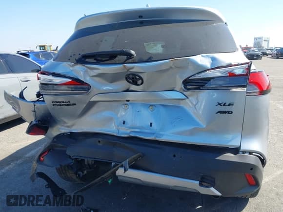 ✅ 2022 Toyota Corolla Cross XLE • VIN: 7MUDAABG9NV033863 • Лот: 41647419. Опубликован ранее на IAAI с пробегом 34 266 миль. Бесплатный доступ к архиву аукционных продаж из США и подробный отчёт об истории автомобиля на DreamBid. Изображение 15.