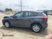 ✅ 2014 Mazda CX-5 Sport • VIN: JM3KE2BE5E0350057 • Lot: 42145910. Listed on IAAI with 157,517 mi. Free auction sales archive from the USA and detailed vehicle history report at DreamBid. Image 14.