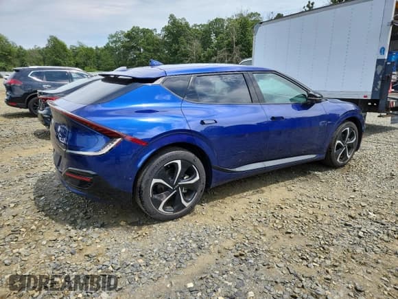 ✅ 2023 Kia EV6 GT-Line • VIN: KNDC4DLC8P5128871 • Лот: 65474485. Опубликован ранее на Copart с пробегом 15 286 миль. Бесплатный доступ к архиву аукционных продаж из США и подробный отчёт об истории автомобиля на DreamBid. Изображение 3.