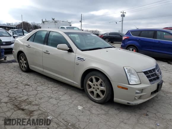 ✅ 2011 Cadillac STS RWD • VIN: 1G6DX6ED1B0159272 • Lot: 82763734. Listed on Copart with 149,343 mi. Free auction sales archive from the USA and detailed vehicle history report at DreamBid. Image 4.